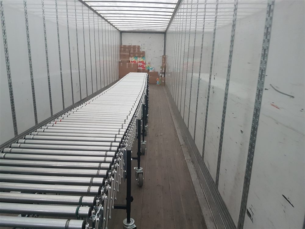 BestFlex powered flexible conveyor running into a trailer