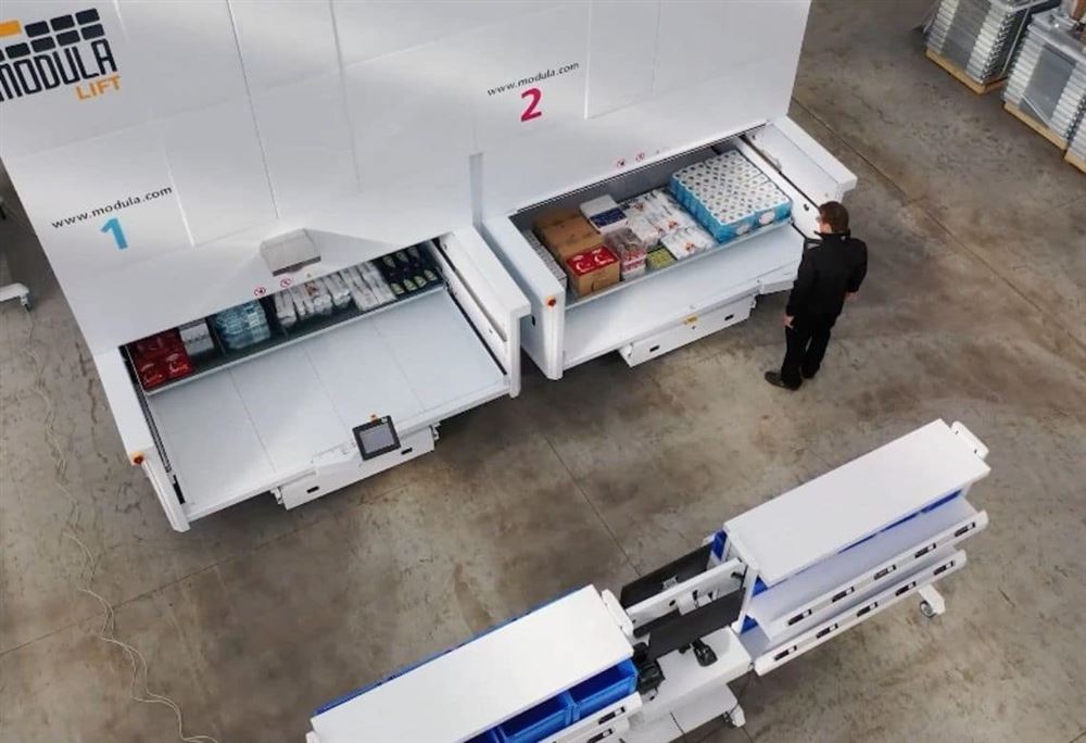 Overhead view of vertical lift modules presenting trays at their bays